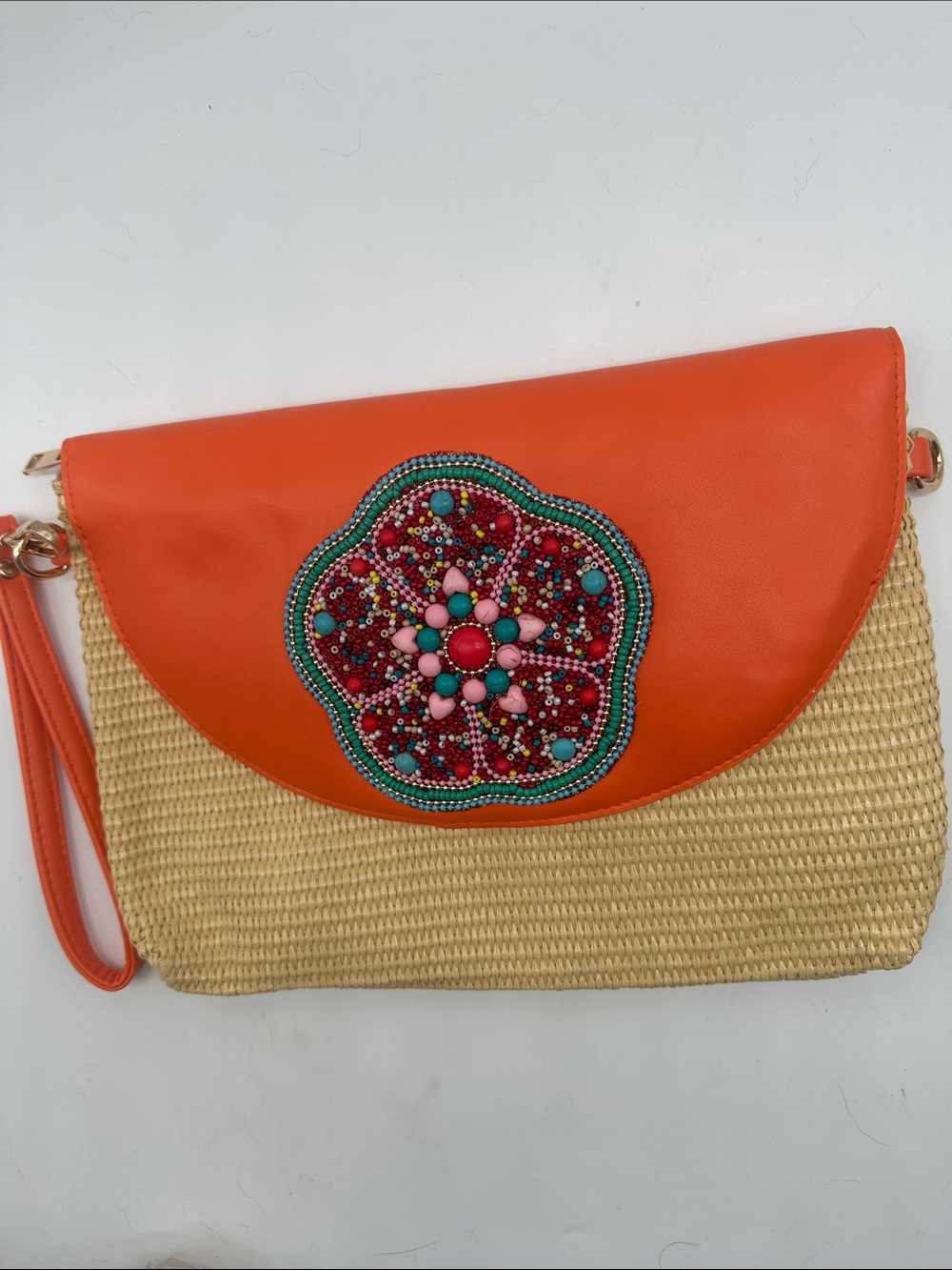 Handcrafted Orange Straw Clutch with Beaded Floral Accent